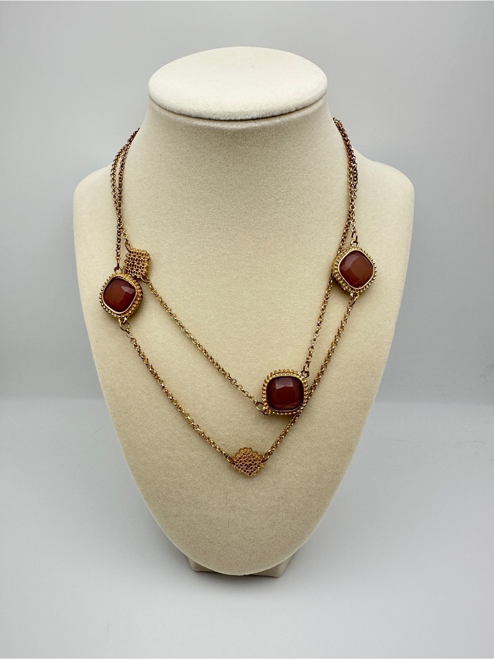 Gold Multi-Strand Necklace with Brown Red Gem Accents